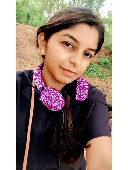 Another look at the headset covers, worn around the neck. They add a fun pop of color and personality.