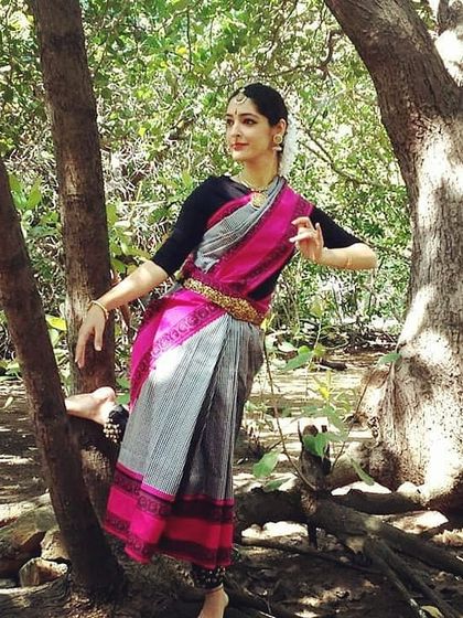 A dance photoshoot in a natural setting. Posing amidst the trees connects the classical art form back to nature, which is a constant source of inspiration in Indian arts.