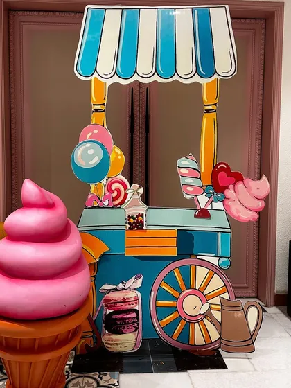 We love bringing whimsical themes to life, like this Candyland baby shower. With oversized ice cream cones, candy cart cutouts, and a pastel balloon palette, we transformed the space into a sweet wonderland to celebrate the new arrival.