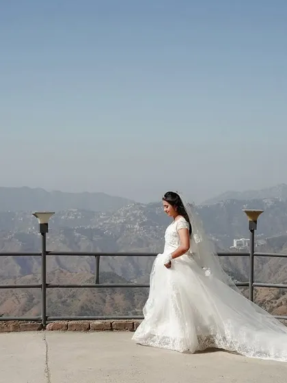 This is what we mean by making the landscape part of the story. We'll show you how to use composition and perspective to frame your subject against a vast mountain range, creating a sense of scale and grandeur that elevates a simple bridal portrait into an epic memory.