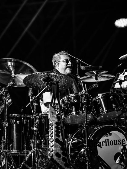 The rhythm section is the heartbeat of any concert. This shot captures the legendary Sivamani in his element, a moment of pure energy that we ensured was captured as part of the event's visual story.