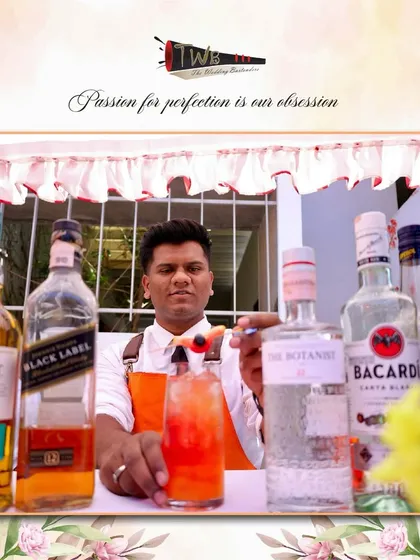 A bartender serves a freshly made cocktail at an outdoor brunch, showcasing our versatility in any setting.