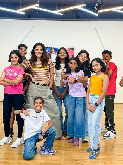 A group photo of our mentor Armitha with her senior kids' batch. We danced the most in March.