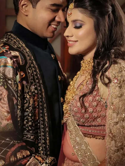 A close, romantic portrait of Deepali and Anmol. The soft lighting and their gentle expressions create a warm and intimate mood, perfect for capturing their love story.