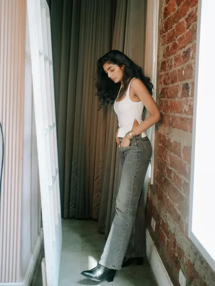 A full-length view of the natural makeup look for a model's portfolio. The makeup is designed to be versatile, working well for both commercial and lifestyle shots.