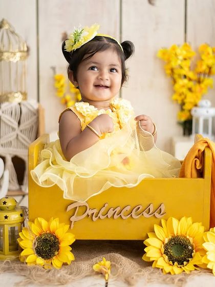 Our little sunflower princess is turning one. The bright yellow theme is full of warmth and happiness, perfect for a birthday celebration.