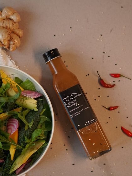 Our Asian Chilli, Toasted Sesame, and Ginger Dressing is perfect for adding an authentic twist to your homemade salads and meals. This flavourful dressing is part of our range of Asian-inspired pantry items.