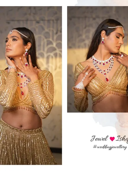 A stunning combination of gold and red for a high-impact reception or sangeet look. This layered ruby and diamond necklace set is designed to be the star of the show, paired here with a matching sheeshpatti, earrings, and hathphool for a complete look.