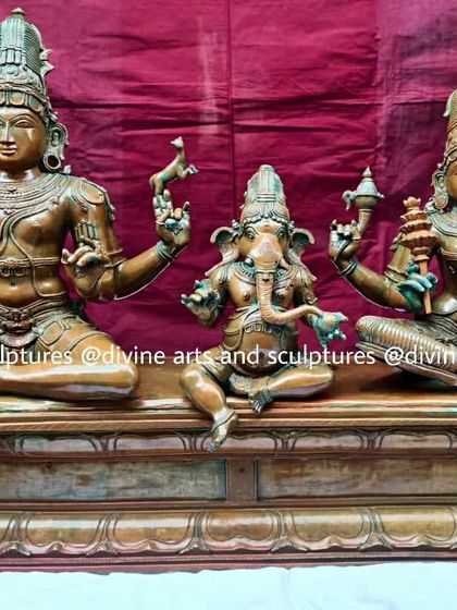 A full view of the 24-inch Shiva Parivaram set, finished with an antique green oxide look. The complete family, including Shiva, Parvati, and a seated Ganesha, is presented on a single pedestal.