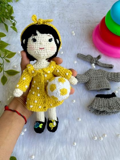 This special project was to recreate a little girl's first birthday outfits on her own mini replica doll. The doll comes with two removable dresses and accessories, making it a beautiful toy and a cherished memory keeper.