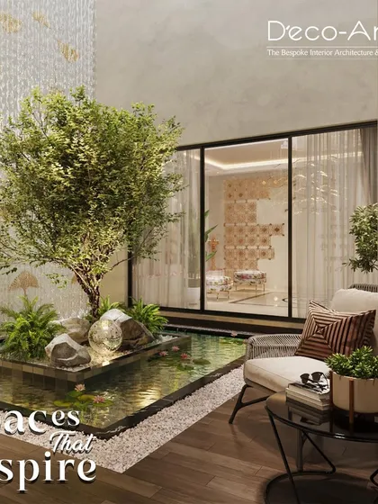 I design spaces that inspire tranquility by bringing nature indoors. This serene courtyard, featuring a central water body and lush greenery, acts as the calm, beating heart of the home, seamlessly connecting the interior with the natural world.