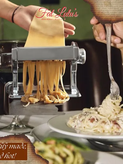 Freshly made, served hot. Watch as I roll out fresh pasta dough while a creamy fettuccine alfredo is being enjoyed at the table.