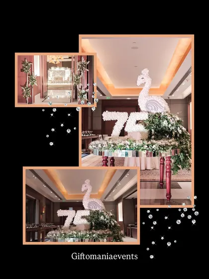 A bespoke floral sculpture created for a 75th birthday. This centerpiece features a peacock crafted from white flowers, perched atop the number '75' also made of flowers, demonstrating my ability to create unique, artistic floral installations.