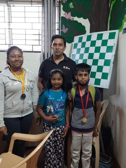 Pictured with the winners of an in-house tournament at our academy: Mahat, Shivani, and Kashvi. These internal events are vital for building confidence and testing new strategies in a friendly environment.