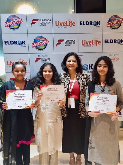 Celebrating student talent at the Eldrok Summit. Here, I am with talented speech and drama performers from RN Shah School, who left the audience of K-12 leaders spellbound with their showcase.