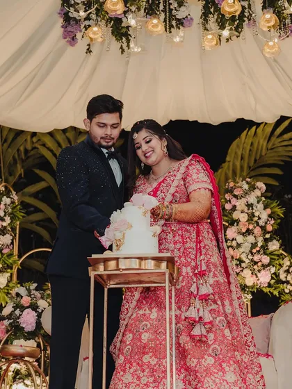 The cake cutting ceremony is a sweet highlight of any reception. We ensure the moment is beautifully staged, with a gorgeous cake and a backdrop that complements the couple's style.