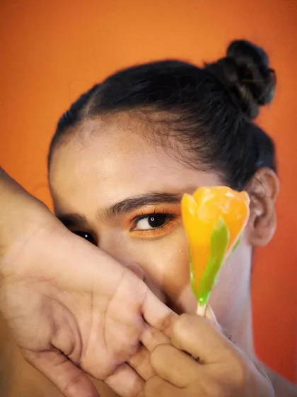 A mysterious and intriguing look, using the prop to create focus on the eyes. This is great for beauty campaigns focusing on eye makeup or contact lenses.
