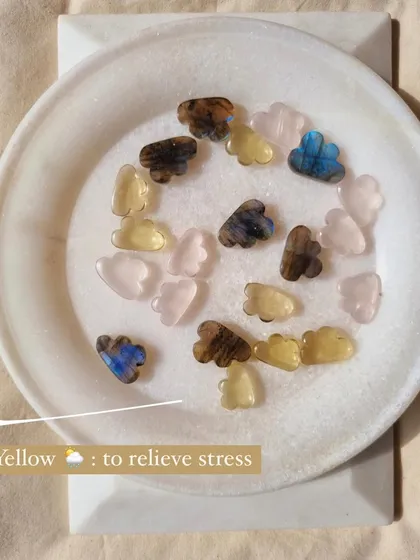 A bowl of my candy clouds, waiting to be made into pendants. The yellow lemon quartz is for stress relief, while the others have their own unique magic.