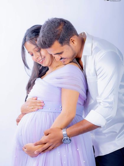 An intimate close-up of a couple. The Breezy gown's delicate details and soft color are perfect for romantic and tender photos.