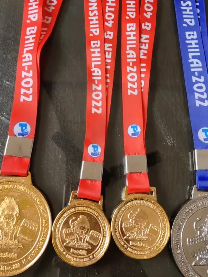 The full medal haul from the 2022 Senior Nationals: two golds, one interstate gold, and one overall silver.