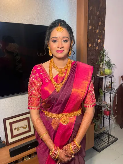 A portrait of the bride, showing how the makeup enhances her features. The matte eyeshadow defines her eyes, while the glossy lips add a touch of modern glam.