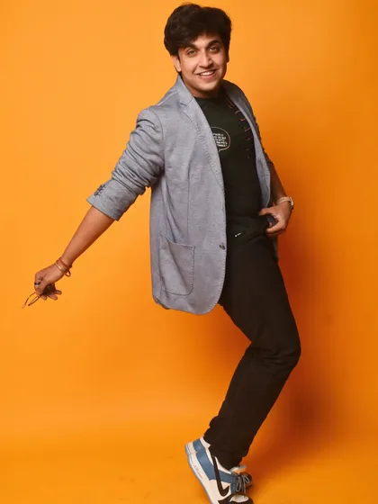 A dynamic, dance-inspired pose from the same studio shoot. It showcases my background as a dancer and my ability to create movement and energy in a still photograph.