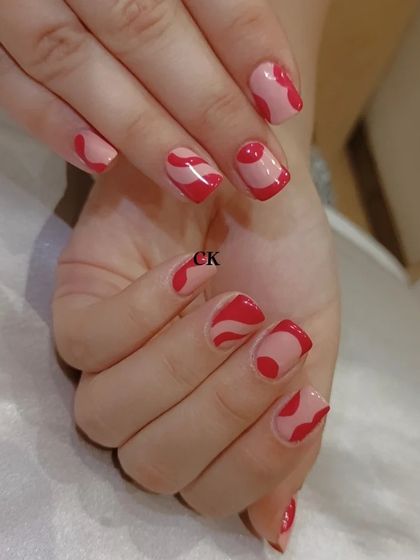 A cool abstract design with red and pink waves.