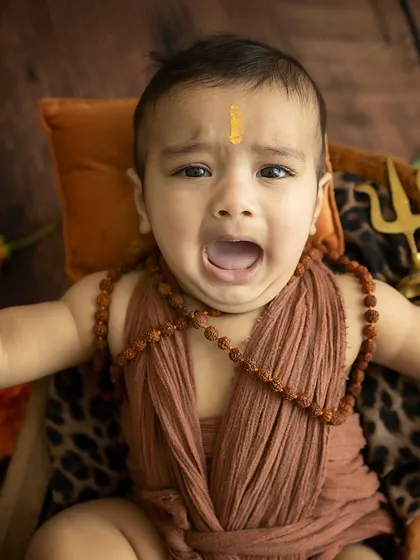 Even a crying moment can be real and powerful. This image captures a raw, unfiltered emotion during the Shiva-themed shoot.