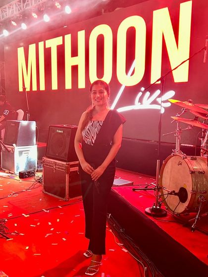 Standing on the 'Mithoon Live' stage. Performing with a music legend like him has been a highlight of my career.