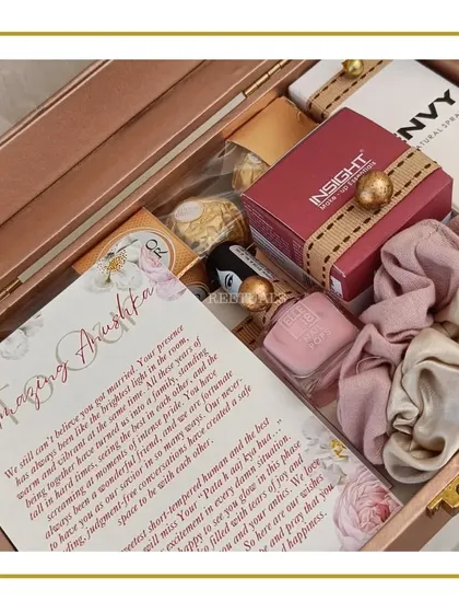 The full view of the open wedding hamper, showcasing the heartfelt letter written for a dear friend on her special day.
