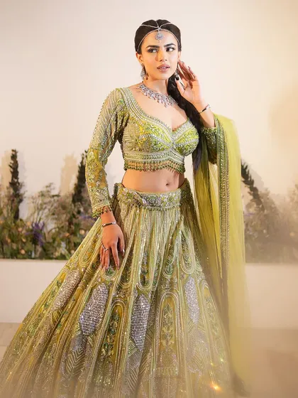 The complete look, with the yellow-green lehenga and the fresh, joyful makeup.