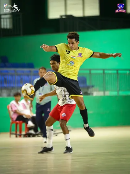 An athletic leap to control the ball during the semi-final.