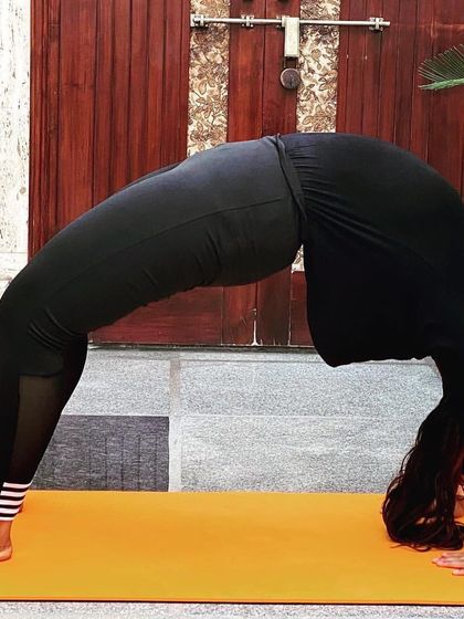 Another shot of the powerful Wheel Pose. Consistent practice helps improve spinal flexibility and opens the heart, which is why I include it in our fusion yoga sessions.