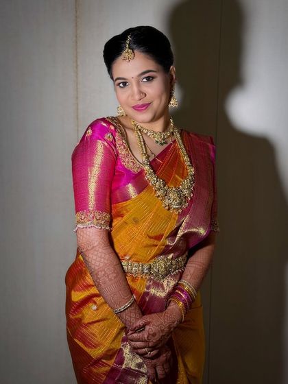 This portrait of Namratha showcases her complete Muhurtham look, from the intricate jewelry to the flawless, natural-looking makeup.