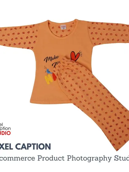 A flat lay of a kids' pajama set, neatly arranged on a white background. This ghost mannequin style is perfect for showing the complete outfit on e-commerce platforms.