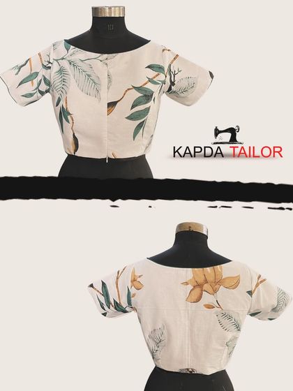This boat neck blouse is crafted from a beautiful floral printed cotton. The simple, clean design allows the delicate pattern of leaves and flowers to be the main attraction.