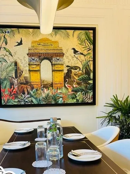 An artwork for Havemore restaurant, framing India Gate within a vibrant, tropical jungle. It's a whimsical take on a beloved Delhi landmark.