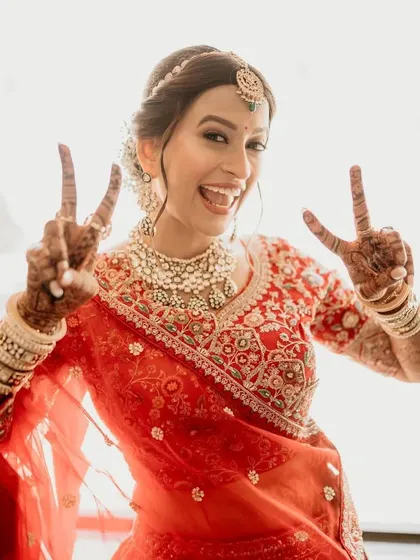 Peace, love, and mehendi. A fun and happy shot of my bride, fully embracing the joy of her wedding celebrations.