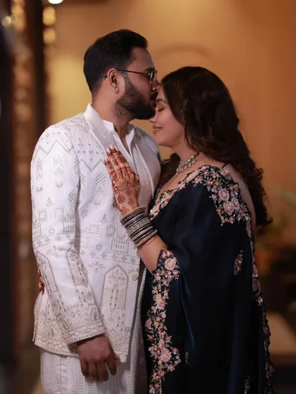 A tender moment from Rachel's engagement. The deep blue saree with floral embroidery was draped to be both beautiful and comfortable for her special day.