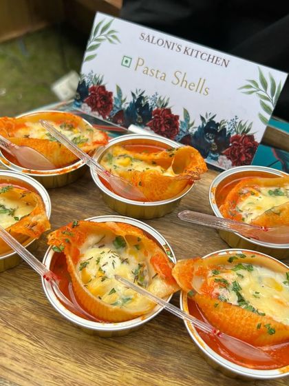 These are my cheesy Pasta Shells, baked in a rich tomato sauce. Served in individual foil cups, they are a comforting and delicious hot appetizer, especially popular at winter events.