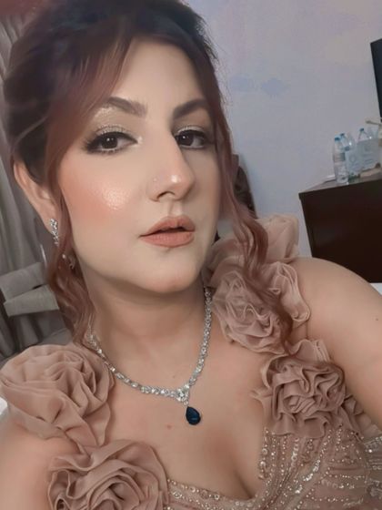 A selfie showing the makeup and jewellery paired with the gown. It's all about the complete look, and my gowns provide the perfect canvas.