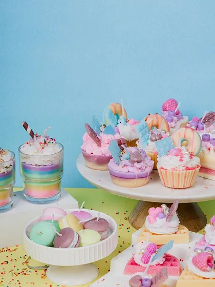 This vibrant spread of dessert candles shows the kind of beautiful and fun creations you can learn to make. We craft everything from rainbow milkshakes and macarons to waffle and cupcake candles.