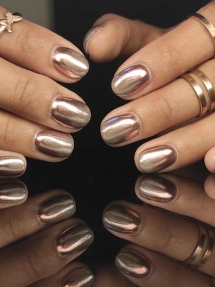 A full view of the stylish rose gold chrome nails, perfect for any occasion.