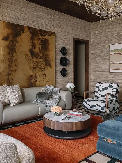 In this project by PS Design, we used a beautiful grasscloth wallpaper to add a layer of natural texture and warmth. The woven fibers of the wallcovering provide a sophisticated, organic backdrop that enhances the room's luxurious and eclectic aesthetic.