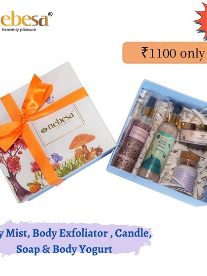 This is one of my popular Rakhi gift hampers. It includes a body mist, body exfoliator, a small candle, a handmade soap, and body yogurt, all beautifully packaged with a free Rakhi. It's a complete self-care kit for your sibling.