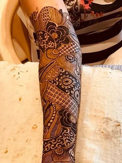 A full arm of intricate, flowing patterns. This is the kind of design you can get lost in.