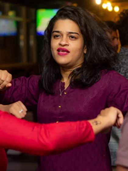 Another shot of this guest's energetic dancing. The party vibe is real.