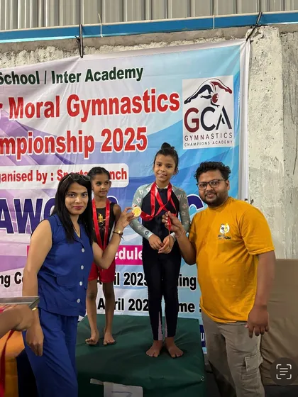Presenting a medal to one of our talented students. Seeing their hard work pay off is the best reward.