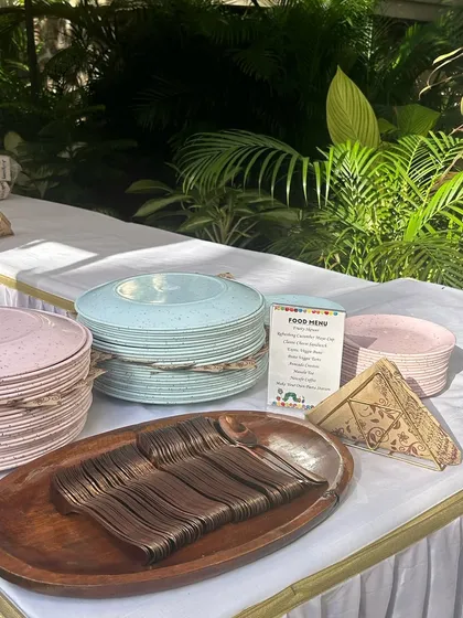 Themed cutlery and plates for a kids' party. I can help source or provide tableware that matches your party's theme, like this fun setup for a "Very Hungry Caterpillar" birthday.