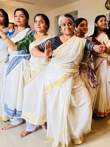 Our Samarpana family, united in dance. This group pose captures the synchronicity and collective energy we bring to every performance, a true 'samarpanam' or offering at the lotus feet of the divine.